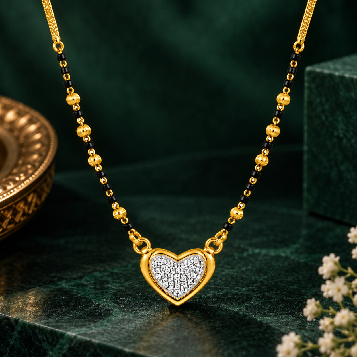 Nakoda Jewellers Heart-Motif Gold Mangalsutra with Stone Detail - Image 3